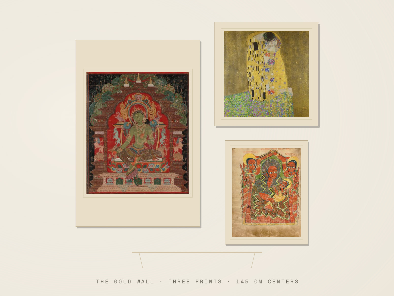 A pale feature wall above a console: Green Tara at 24×36 inches on the left, with The Kiss at 20×20 inches hung above the smaller Ethiopian Virgin and Child at 16×20 inches in a column on the right.